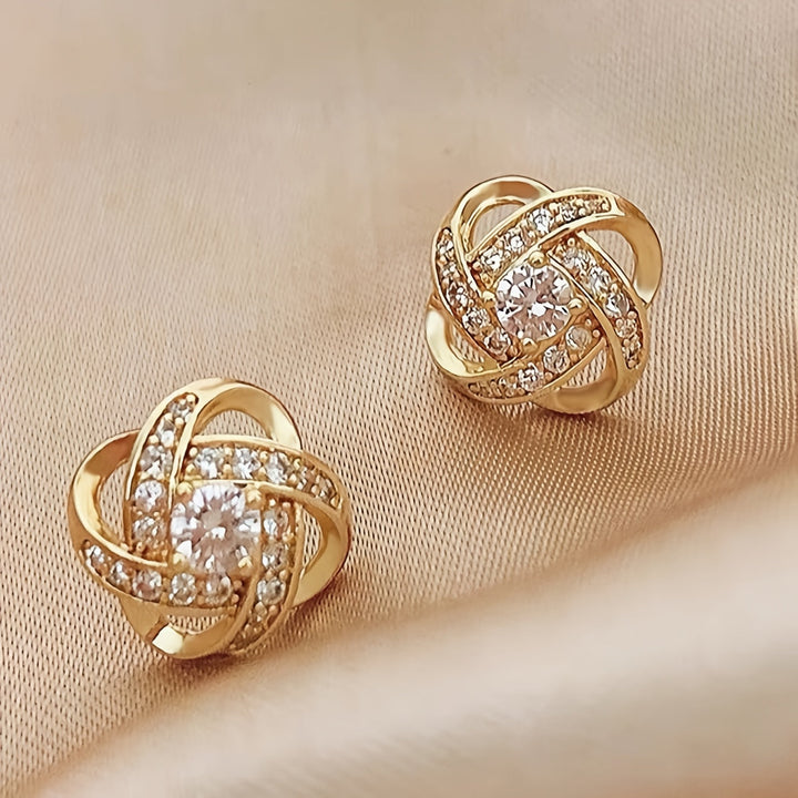 Earrings with purple clover