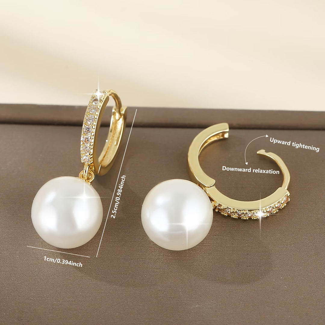 The modern pearl drop earrings