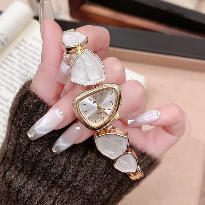Gold watch with turquoise stone
