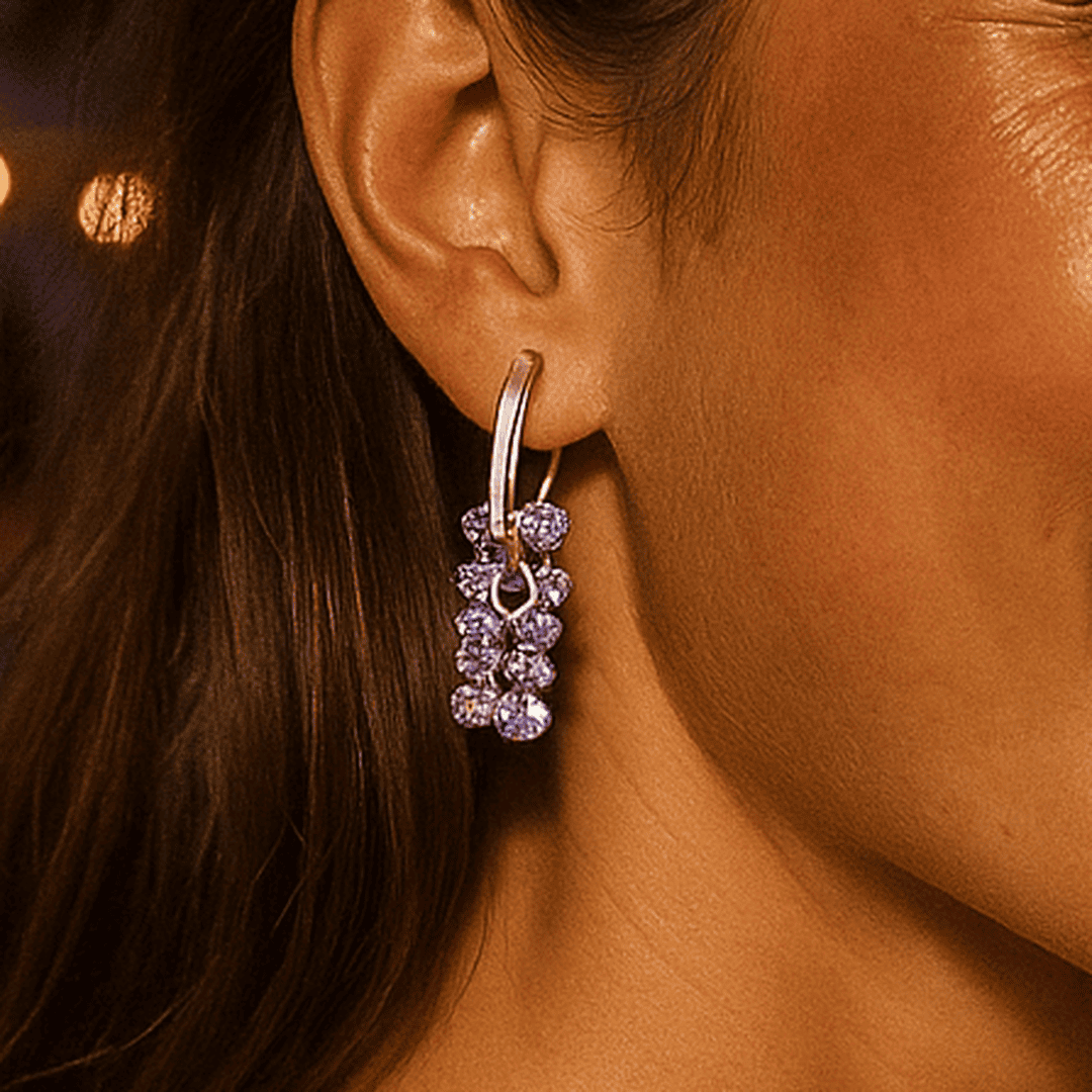 Pearl earrings with purple stones