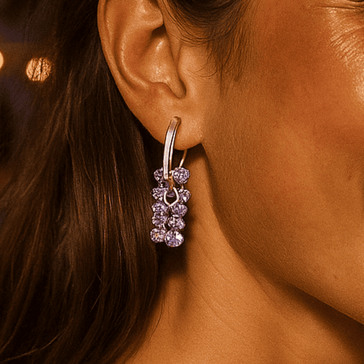 Pearl earrings with purple stones