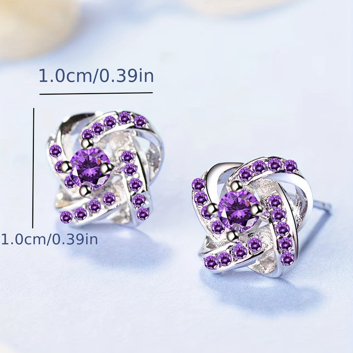 Earrings with purple clover