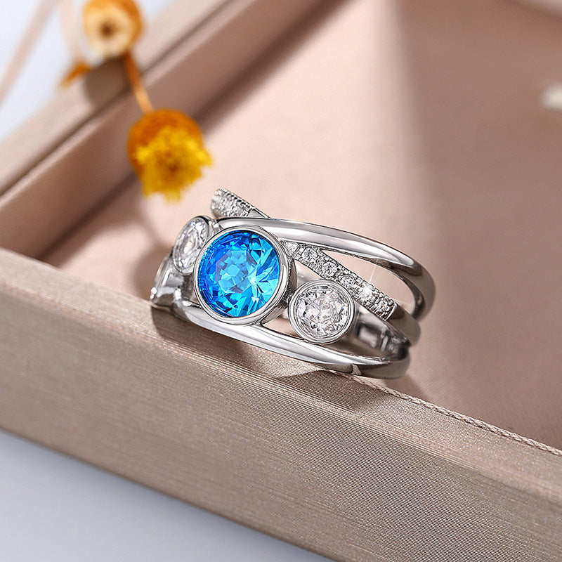 Blue Topaz Statement Ring with Split Band and Pavé Accents
