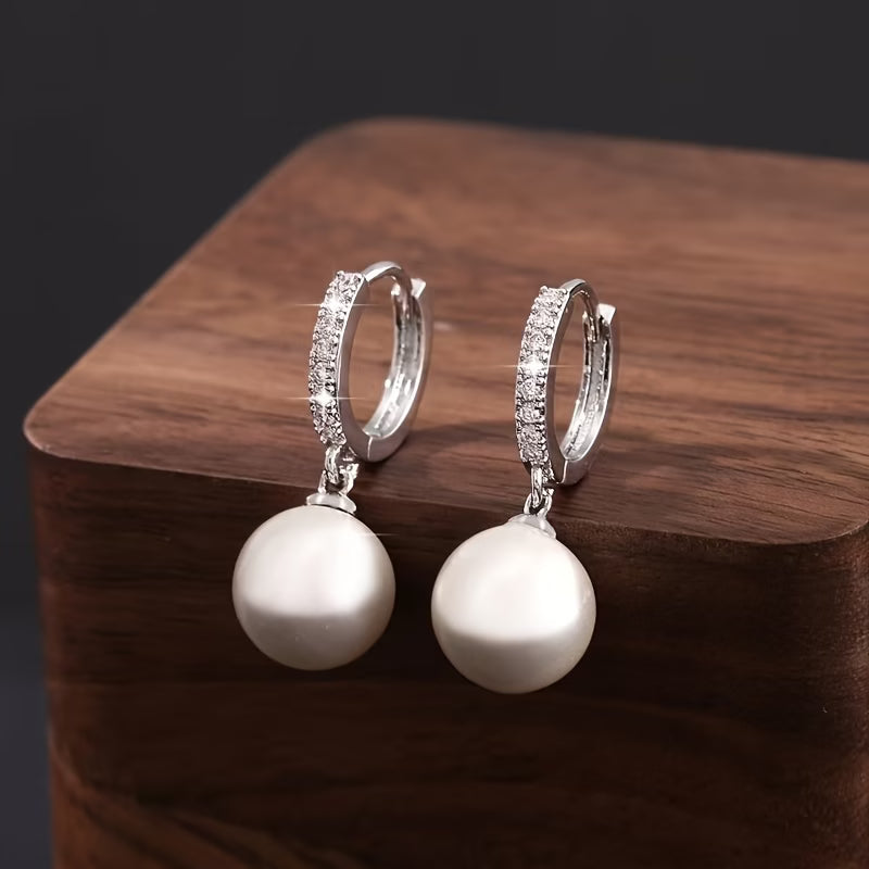The modern pearl drop earrings