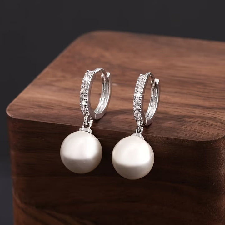 The modern pearl drop earrings