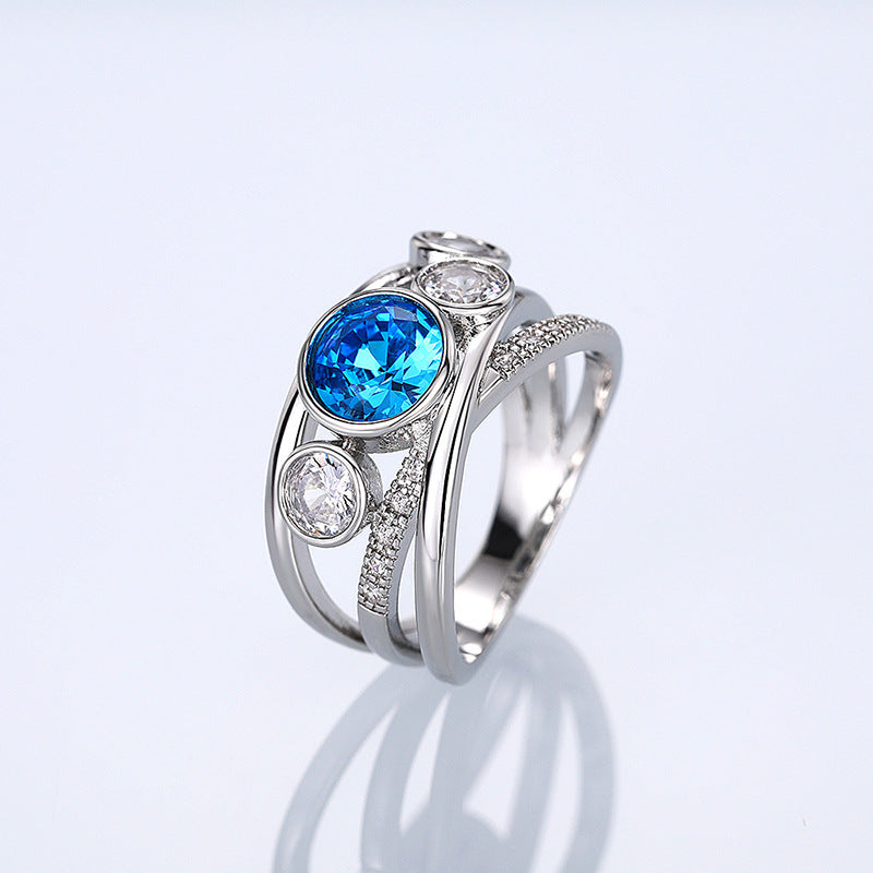 Blue Topaz Statement Ring with Split Band and Pavé Accents