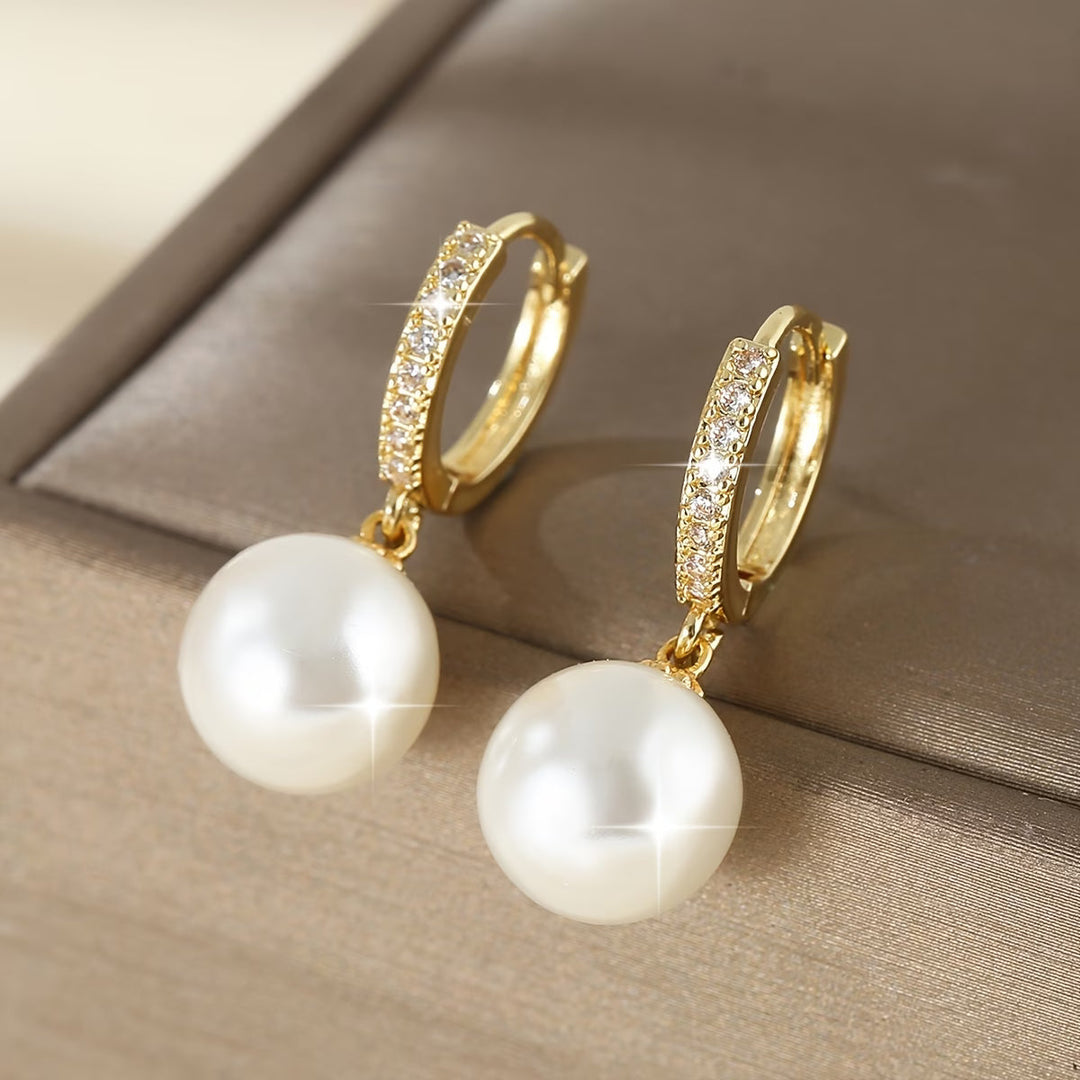 The modern pearl drop earrings