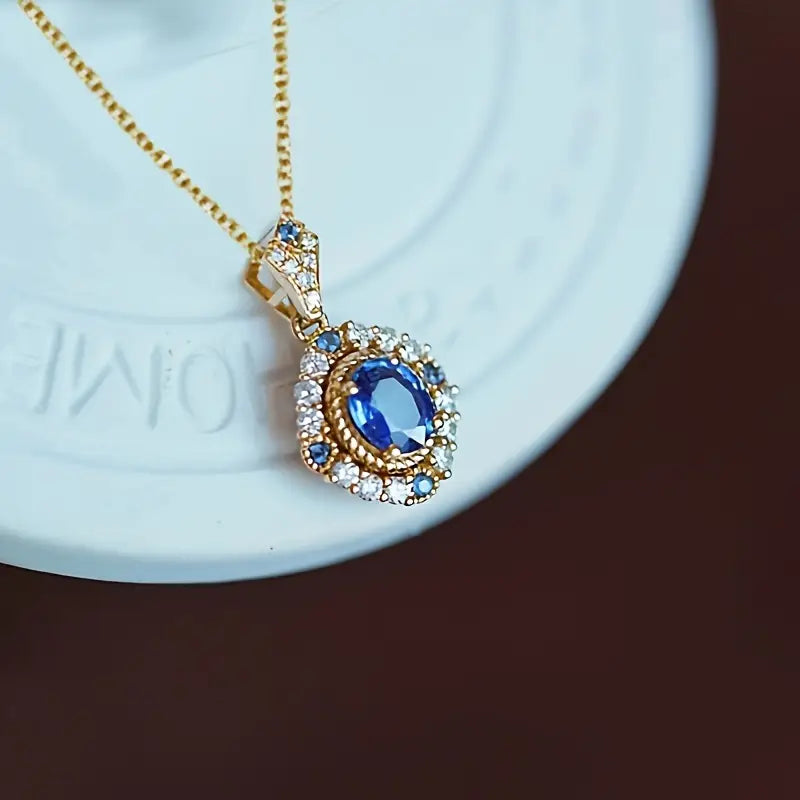 Oval Sapphire Double Halo Pendant Necklace - Gold