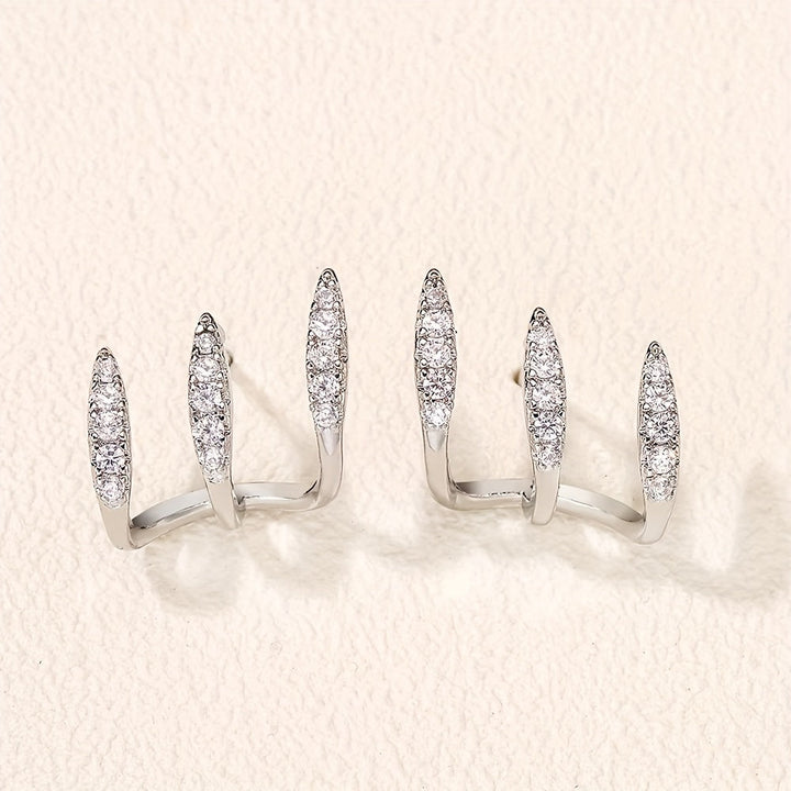 Elegant Earrings with Rhinestones and Three-Prong Setting - Haller