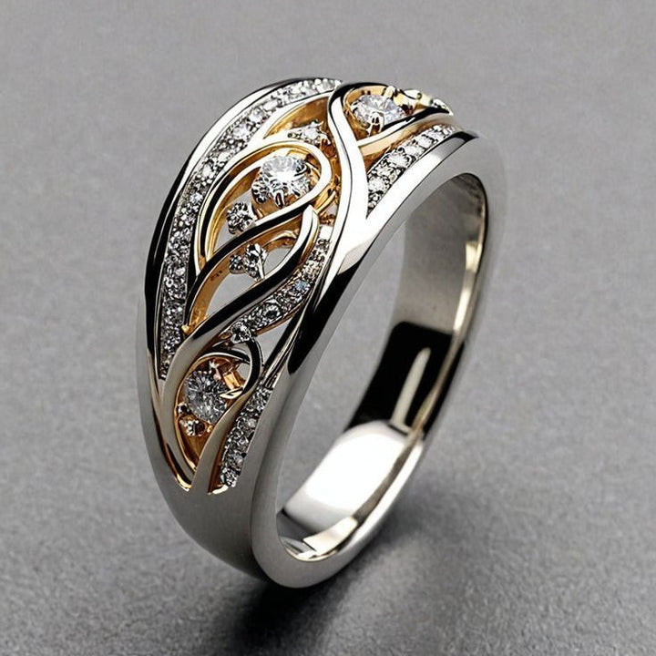 Openwork ring in gold and silver