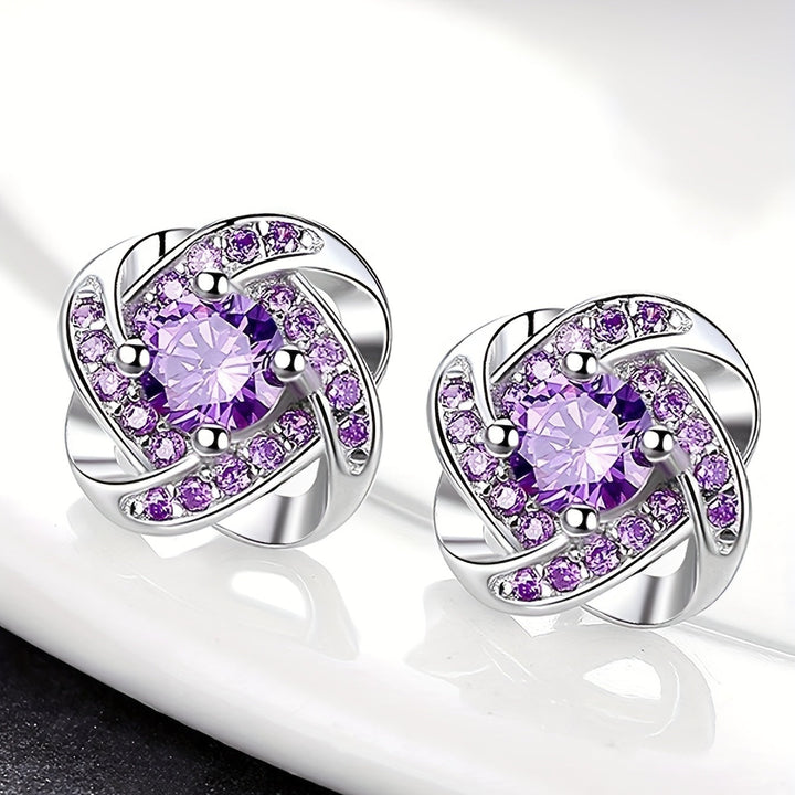 Earrings with purple clover