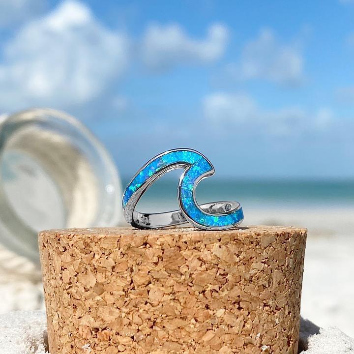 Silver wavy ring with blue opal