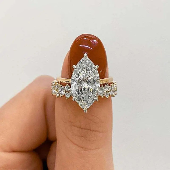 Gold ring with marquise-cut diamond
