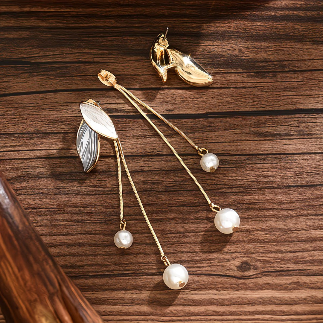 Long beaded leaf earrings