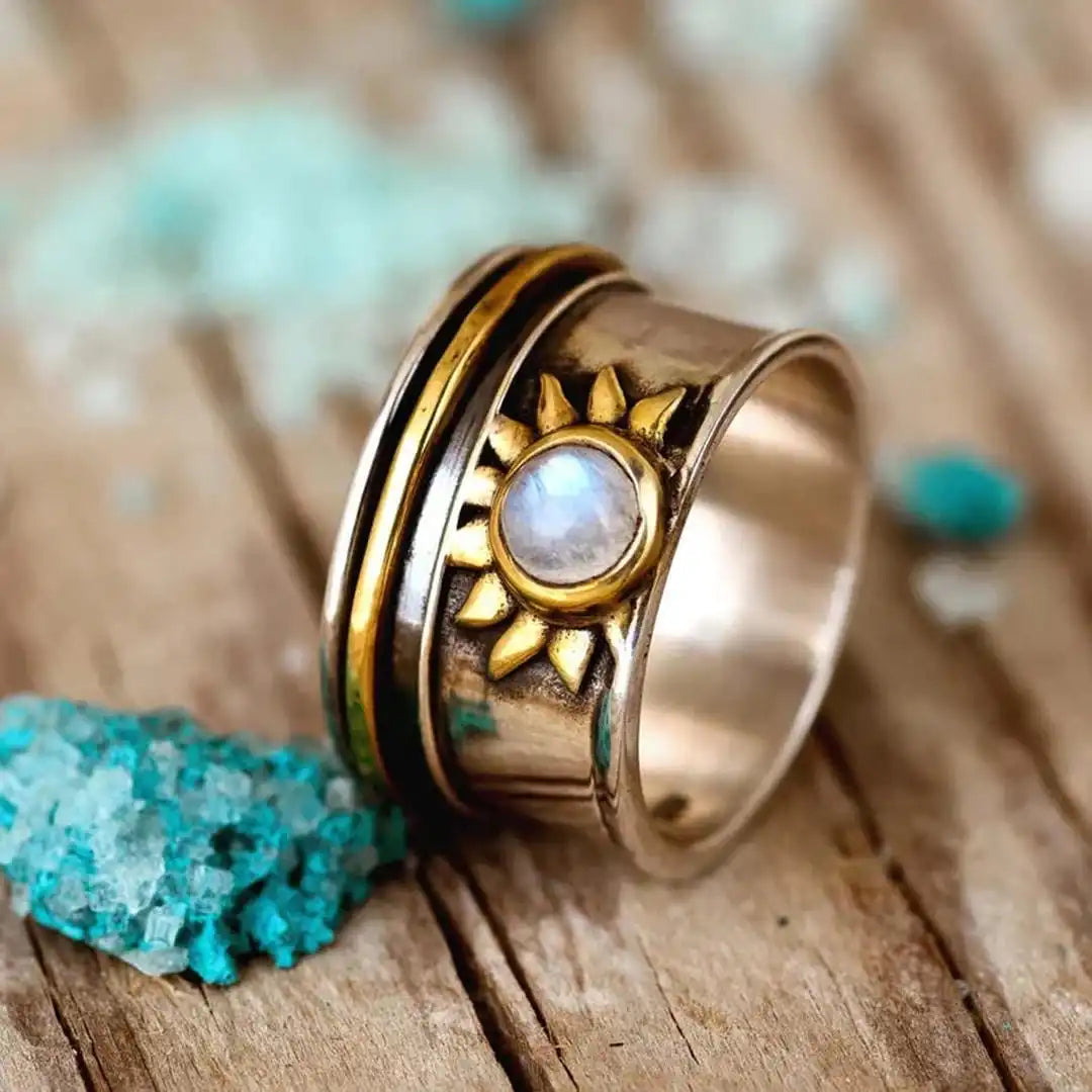 Vintage sunburst ring with white stone