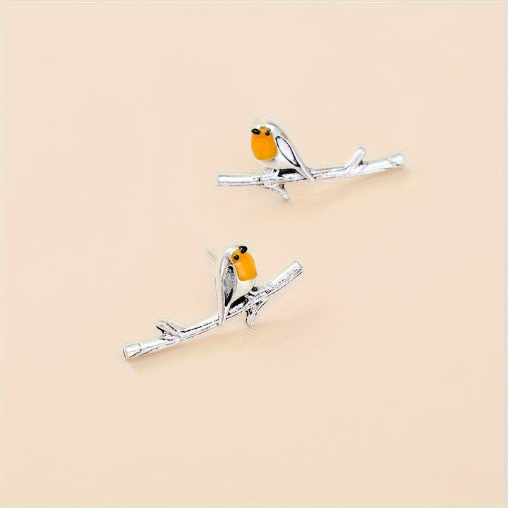Bird motif earrings