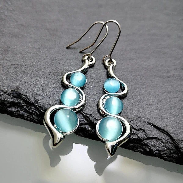 Drop earrings with blue crystal