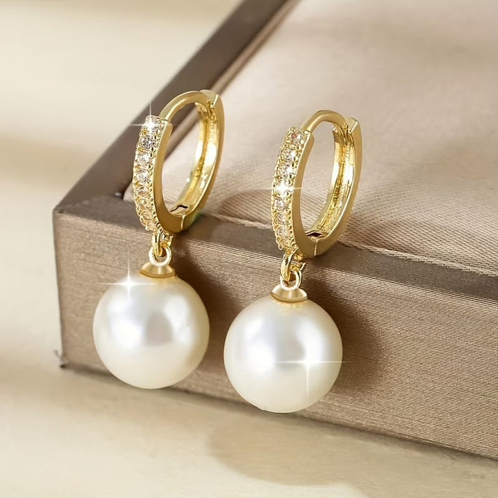The modern pearl drop earrings