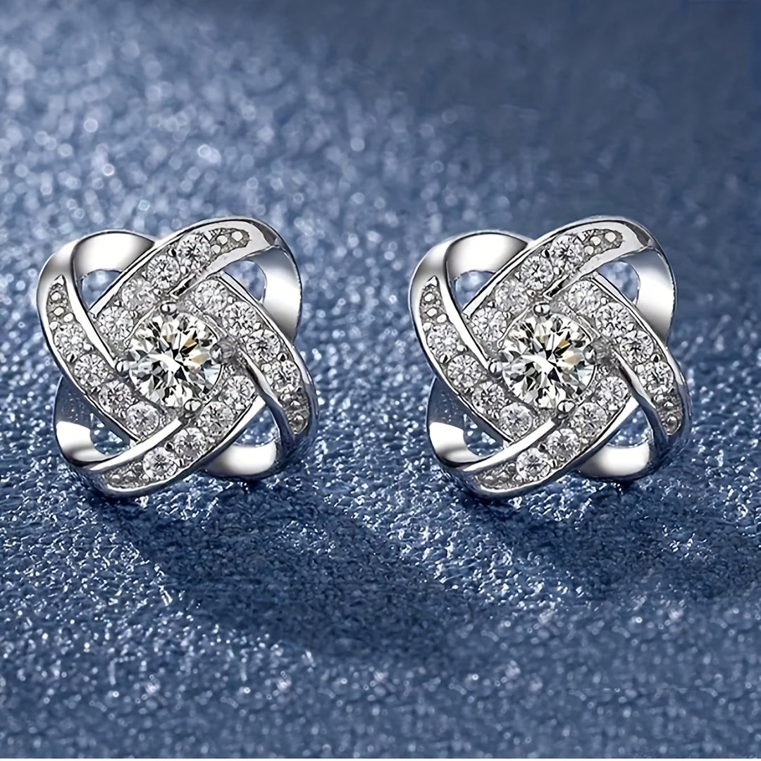 Earrings with purple clover