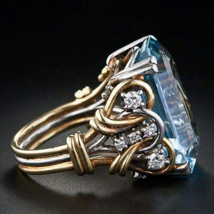 Vintage gold ring with blue zirconia, multi-row