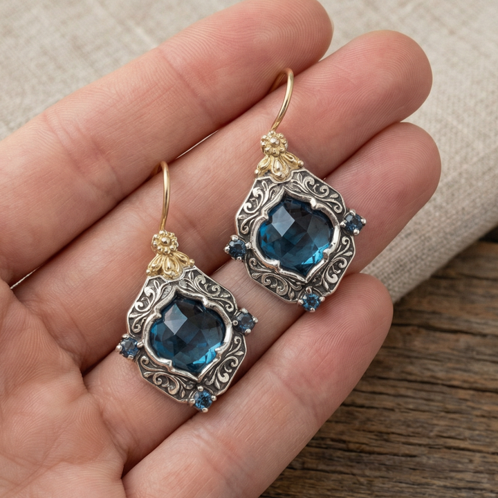 Vintage earrings with blue crystal in gold and silver