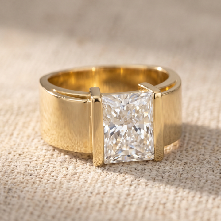 Princess-Cut Solitaire Ring with Bar-Tab Shoulders and Wide Gold-Tone Band