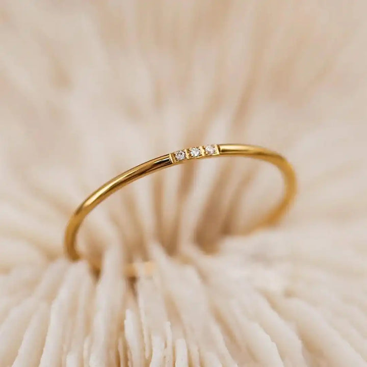 Delicate three-stone stacking ring