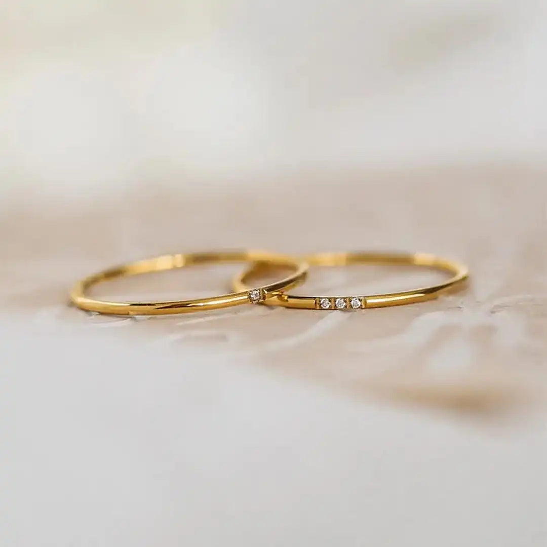 Delicate three-stone stacking ring