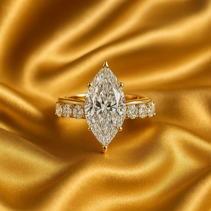 Gold ring with marquise-cut diamond