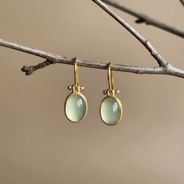 Vintage earrings with green moonstone