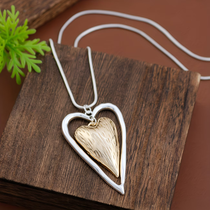 Vintage necklace with heart pendant in silver and matte gold