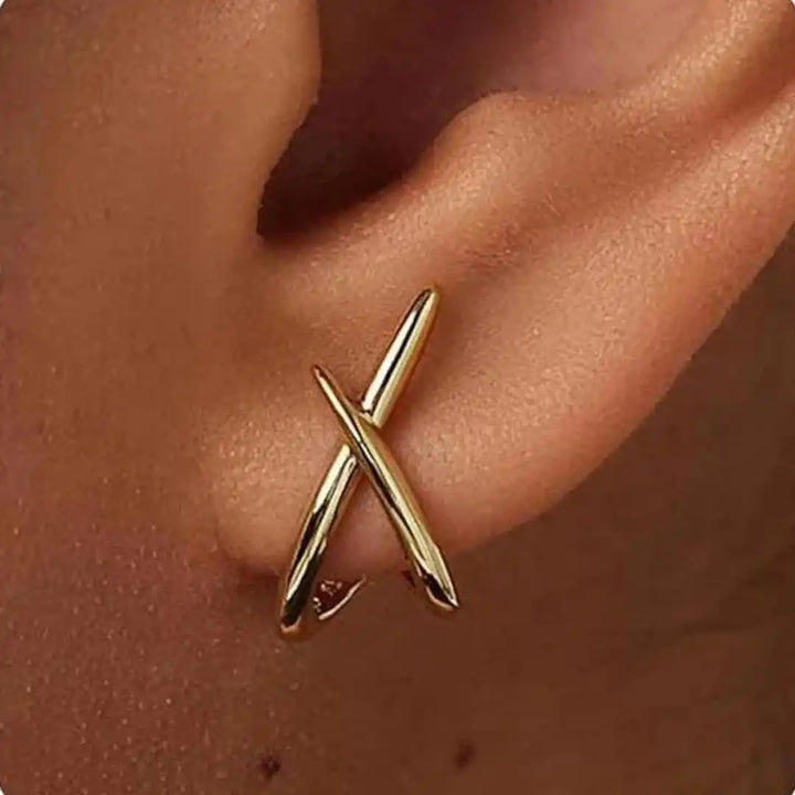 Timeless gold cross earrings