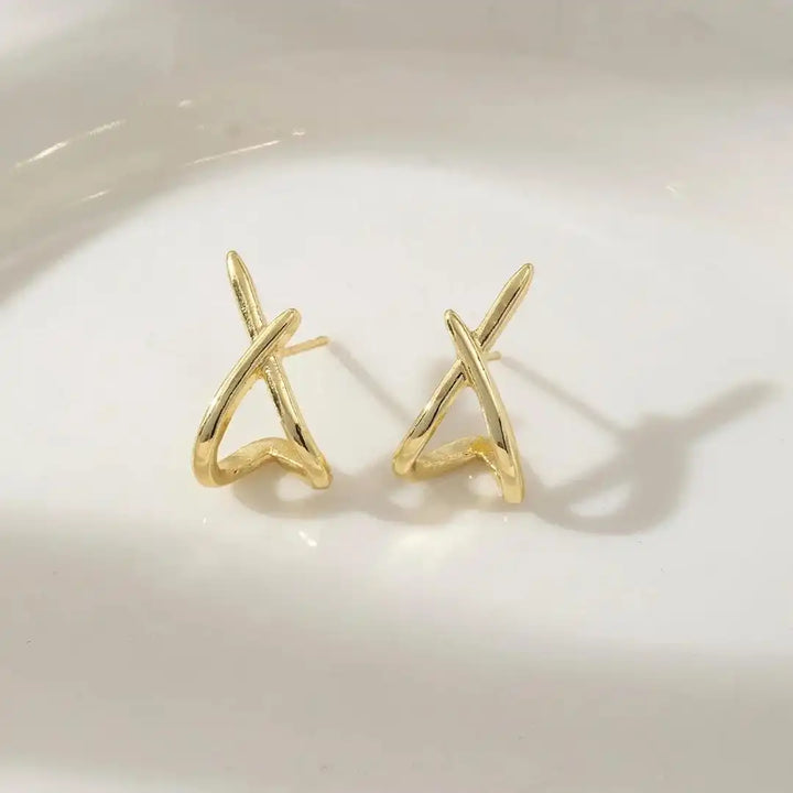 Timeless gold cross earrings