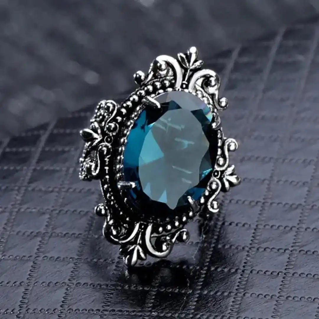 Vintage silver oval ring with blue zirconia