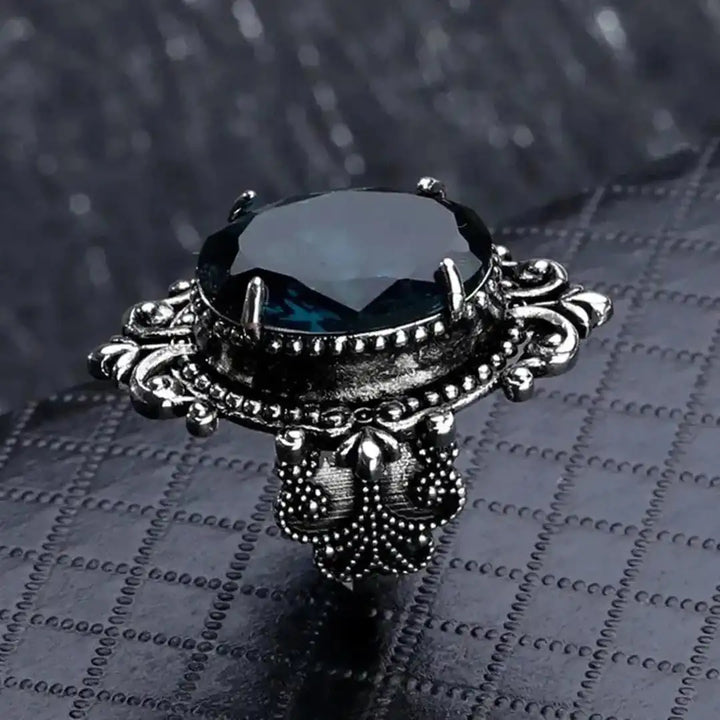 Vintage silver oval ring with blue zirconia