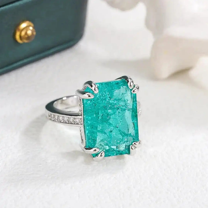 Exquisite blue-green moissanite ring