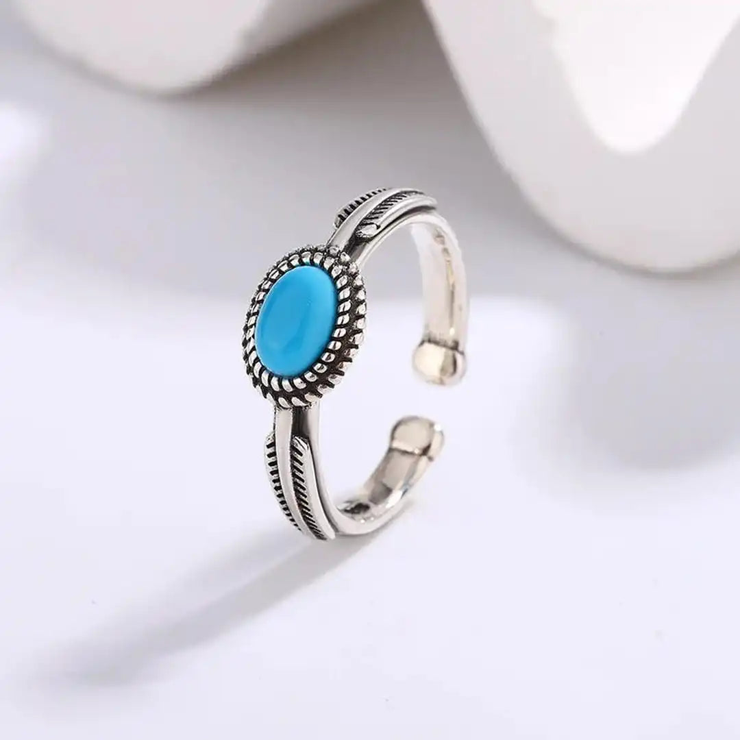 Adjustable silver spring turquoise ring