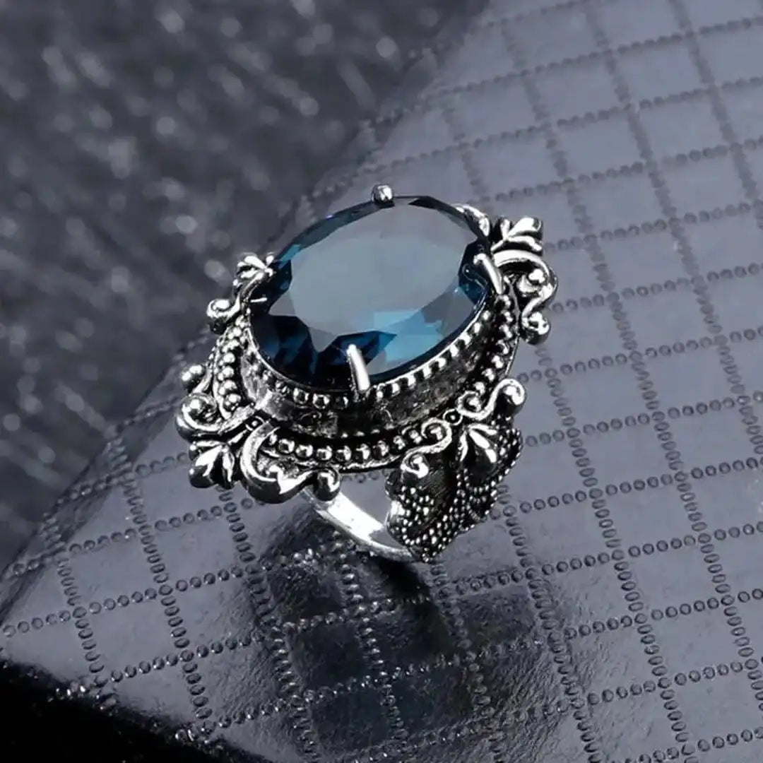 Vintage silver oval ring with blue zirconia