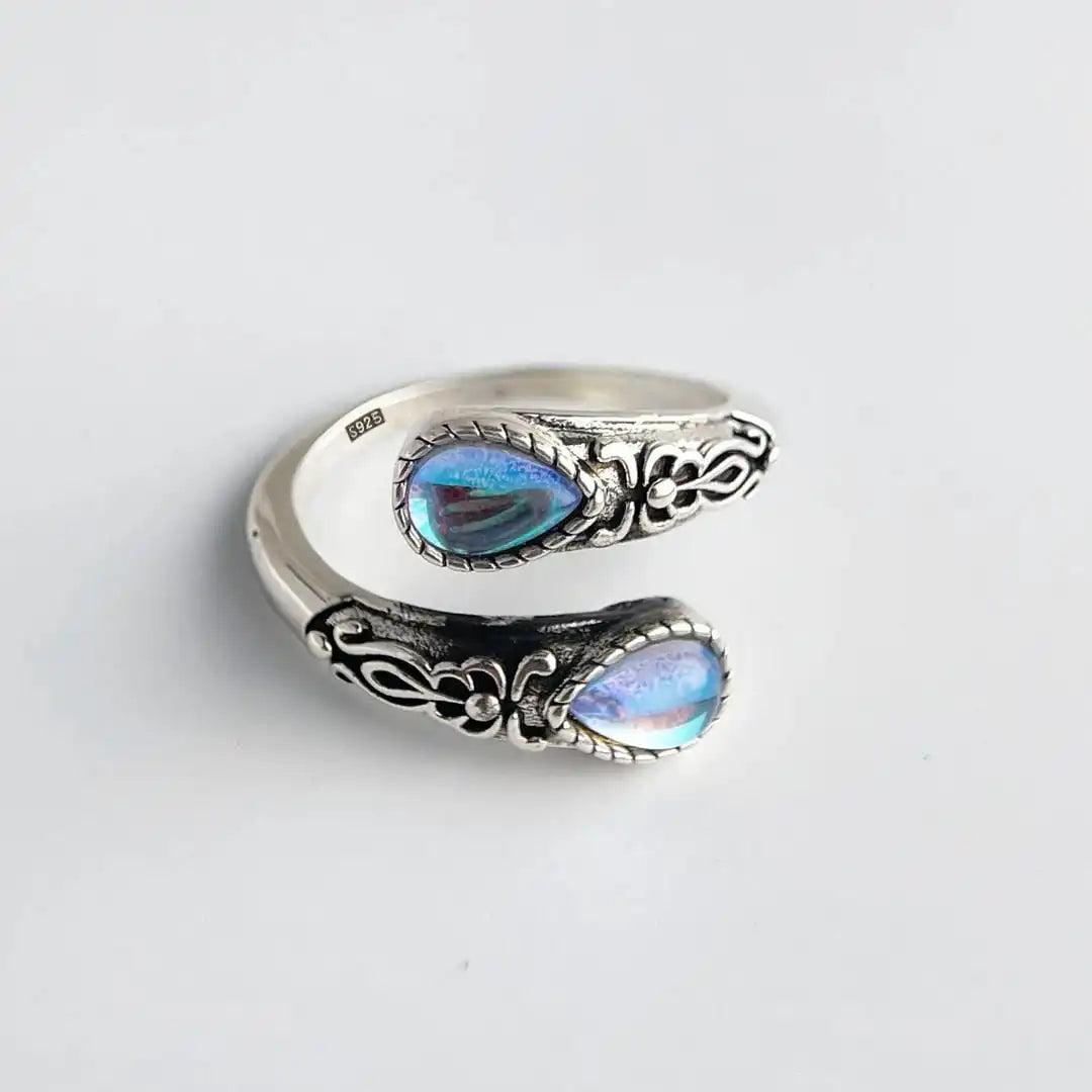 Vintage adjustable silver ring with blue stone