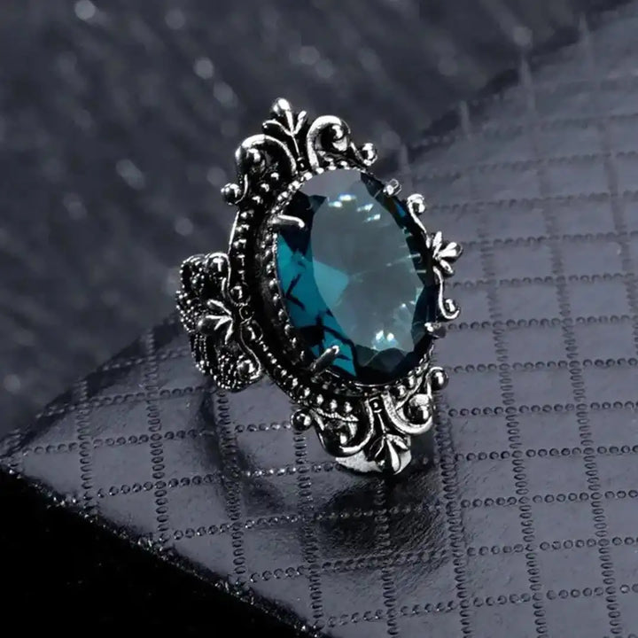 Vintage silver oval ring with blue zirconia