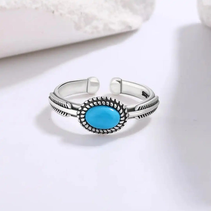 Adjustable silver spring turquoise ring
