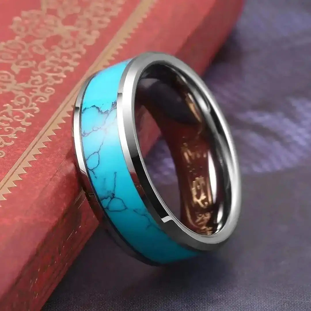 Silver ring with an inlaid turquoise stone