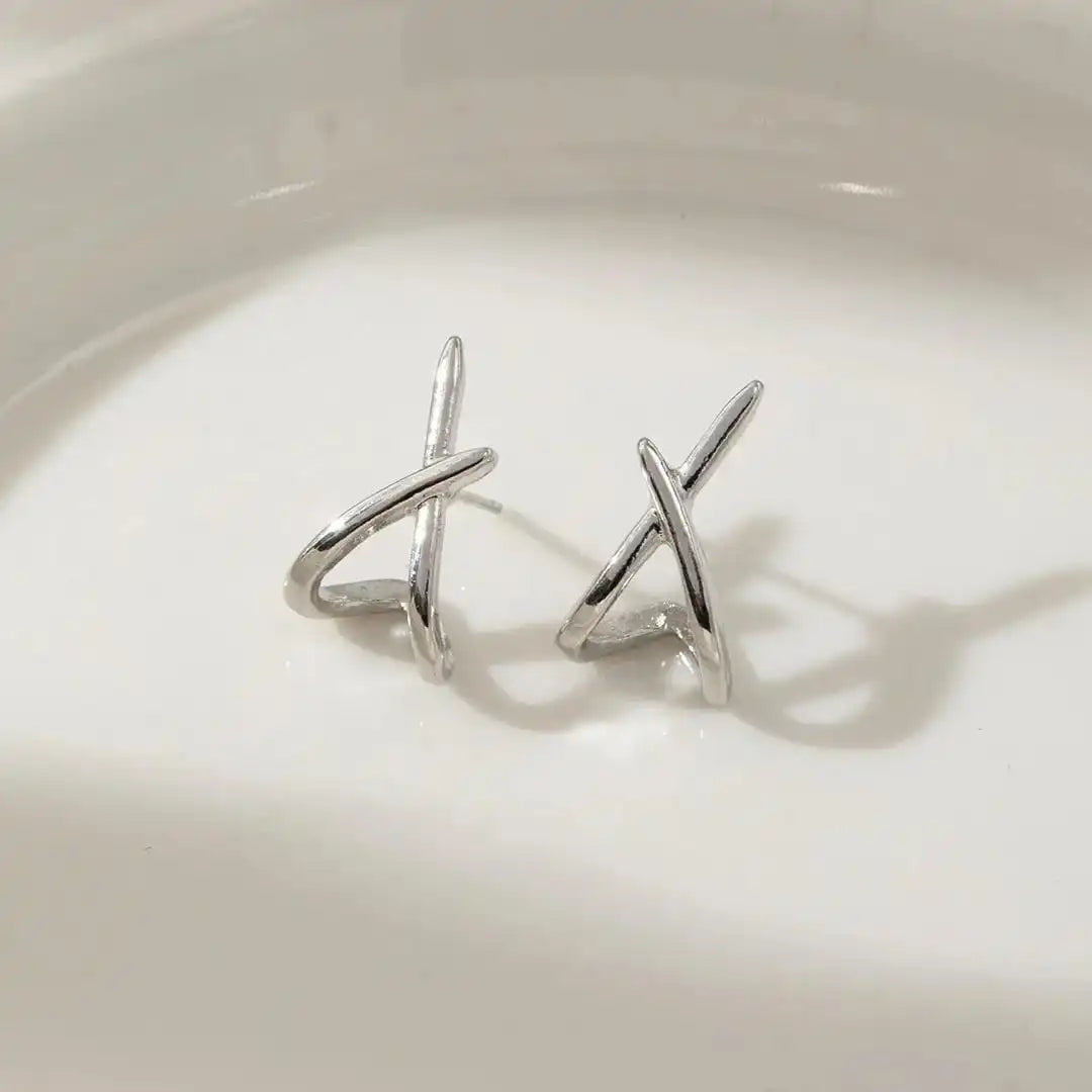 Timeless gold cross earrings