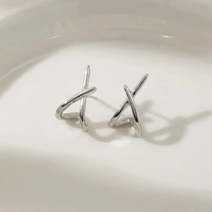 Timeless gold cross earrings