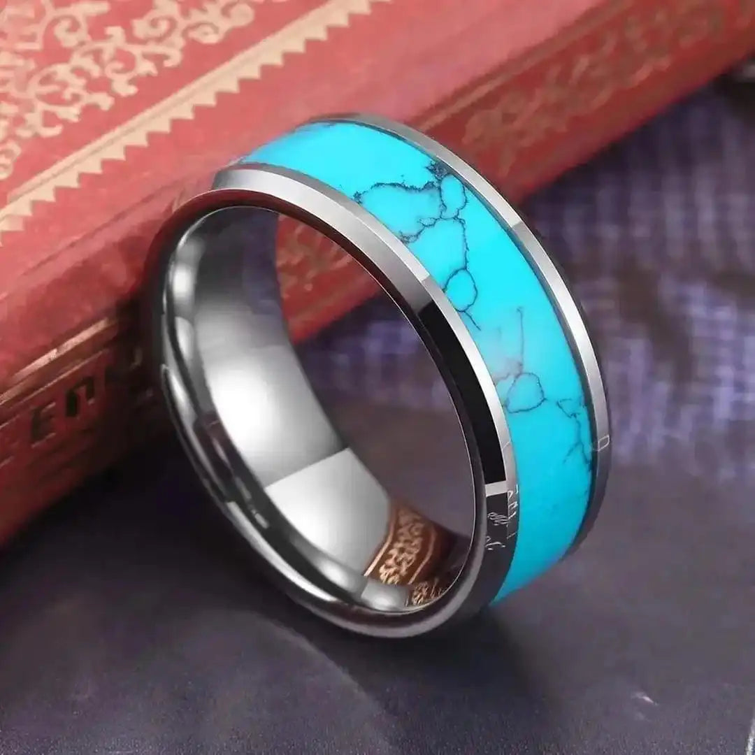 Silver ring with an inlaid turquoise stone