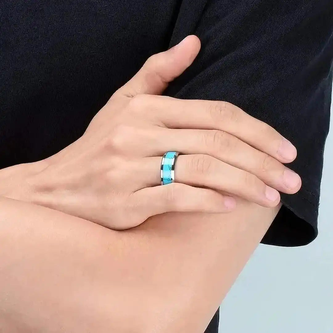 Silver ring with an inlaid turquoise stone