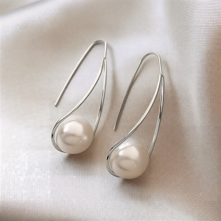 Elegant mystical pearl earrings