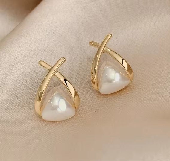 Vintage earrings with pearls, cross and triangle