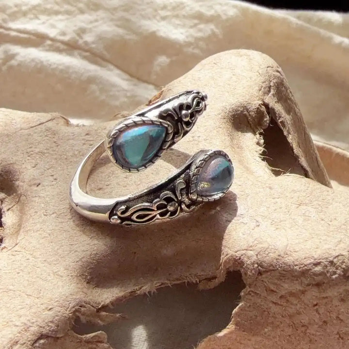 Vintage adjustable silver ring with blue stone