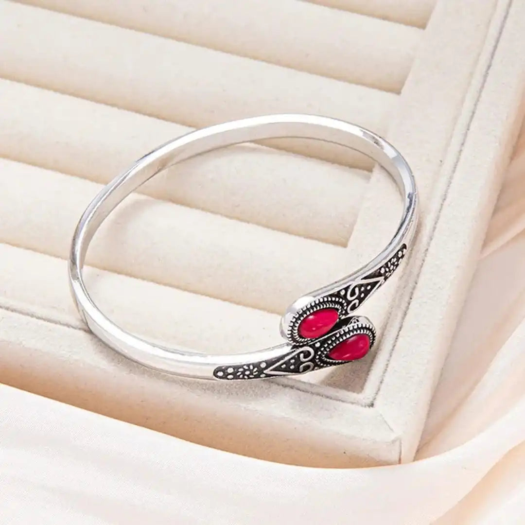 Vintage bracelet with colorful gemstones and tribal design
